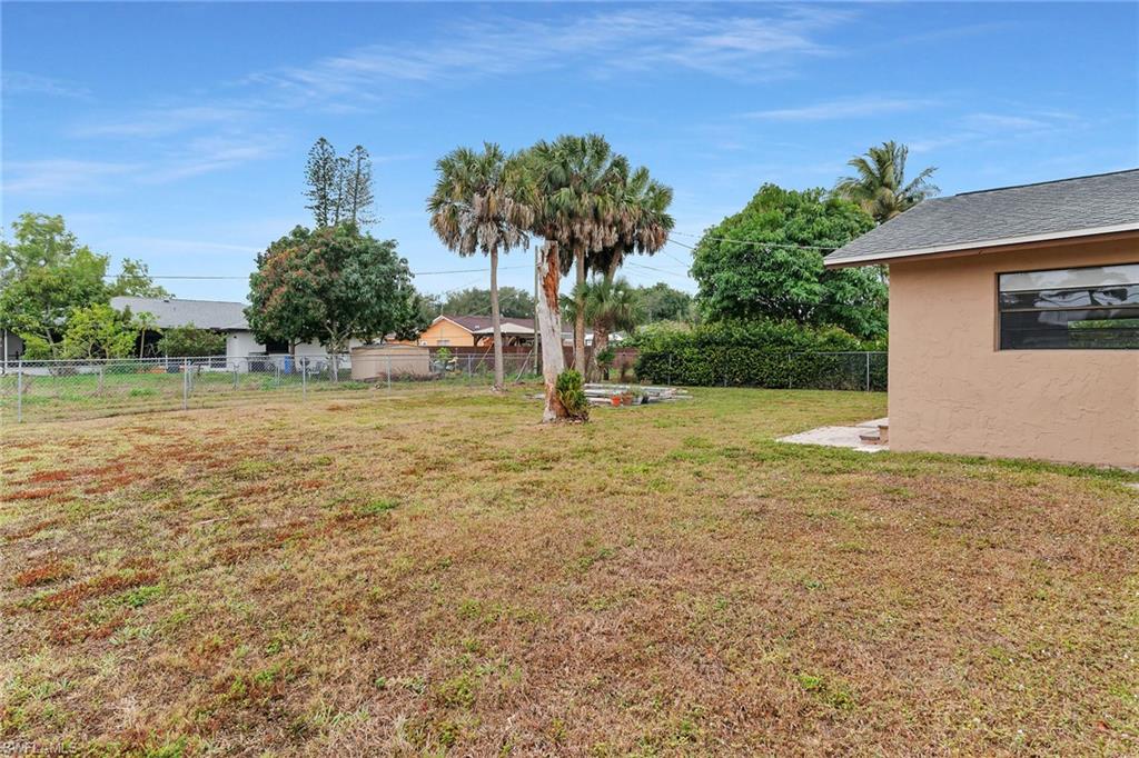 View of fenced backyard