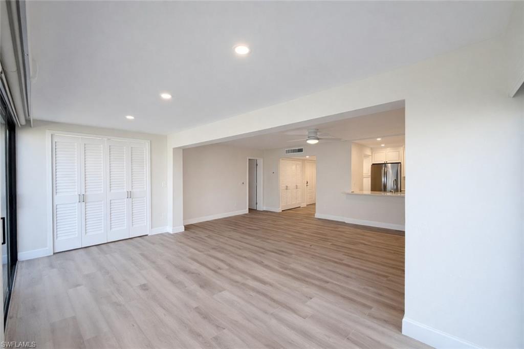 Unfurnished living room with recessed lighting, light wood-style flooring, and ceiling fan