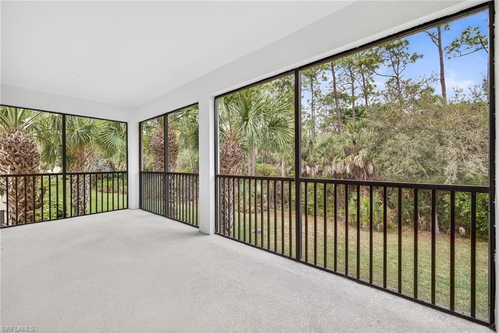 Unfurnished sunroom featuring carpet