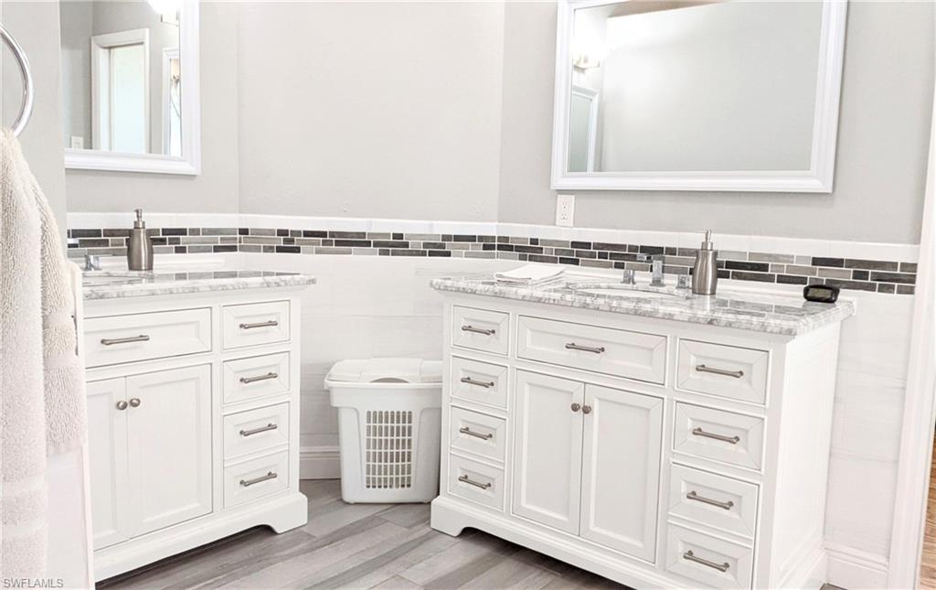 The Main Bedroom En-Suite Features Double Vanities and a Generous Amount of Space & Storage