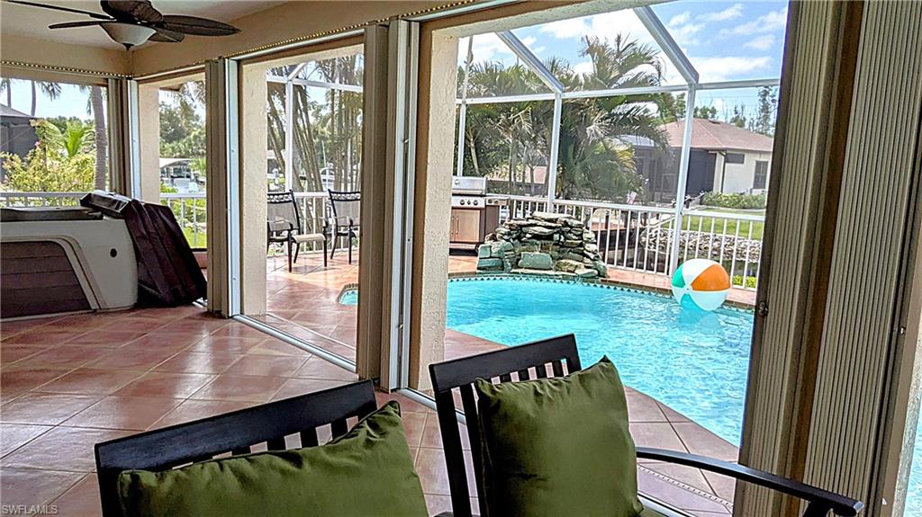 The Lanai Features a Very Large Space for Relaxing & Entertaining.  The Lanai Becomes a Fully Enclosed & Weatherproofed Area by Sliding the Accordion Hurricane Shutters Closed.