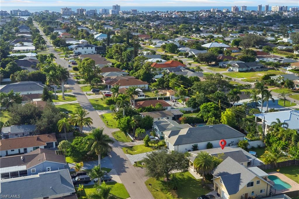 View of property location with nearby suburban area