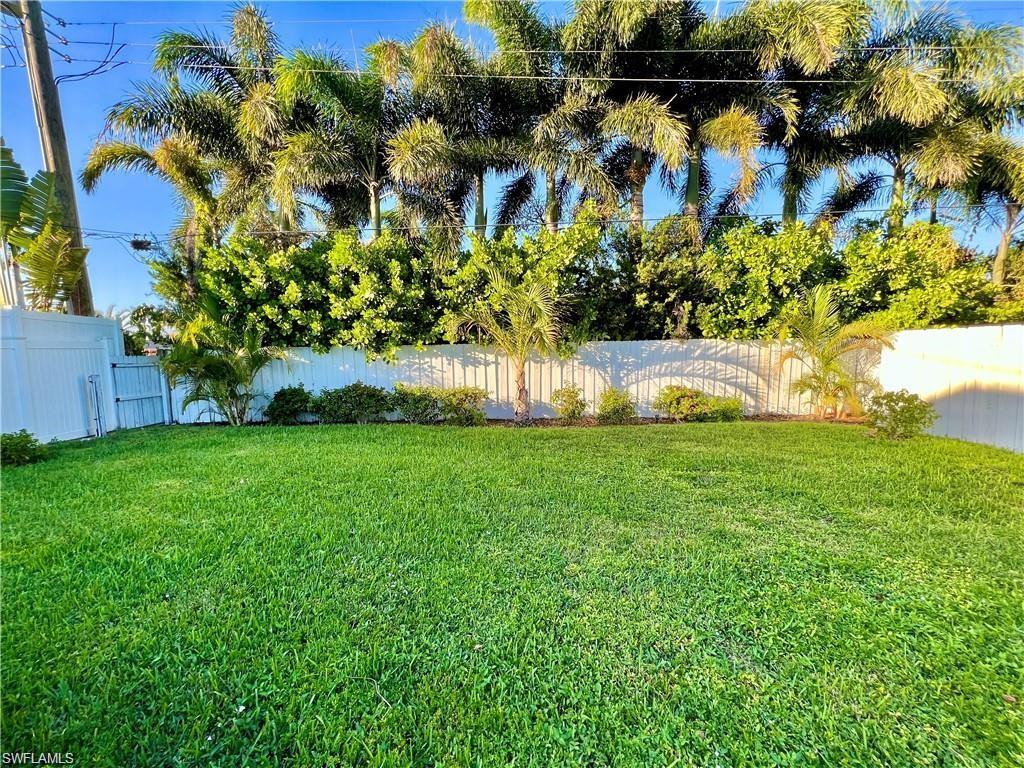 View of fenced backyard