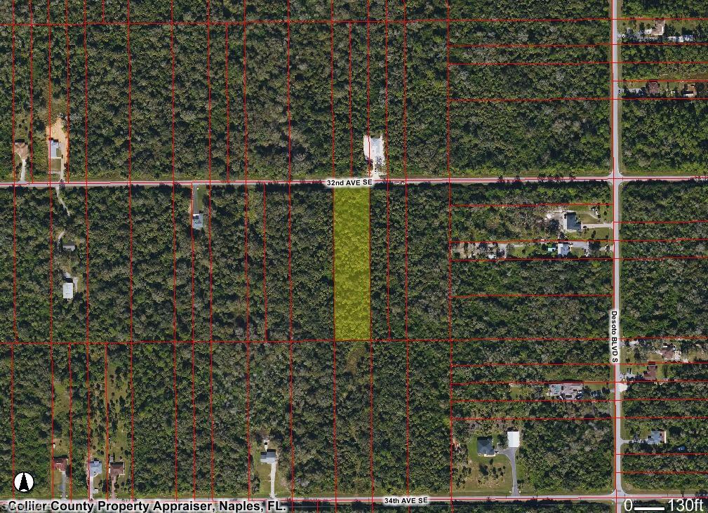 Aerial view of property's location featuring property parcel outlined