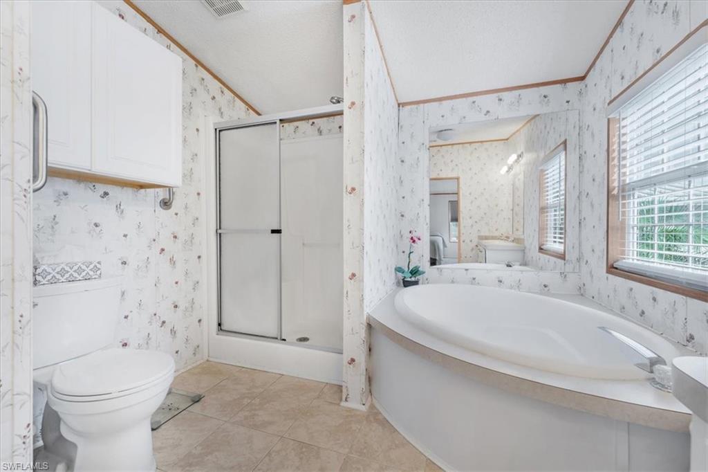 Primary Bathroom with Soaking Tub and Walkin Shower