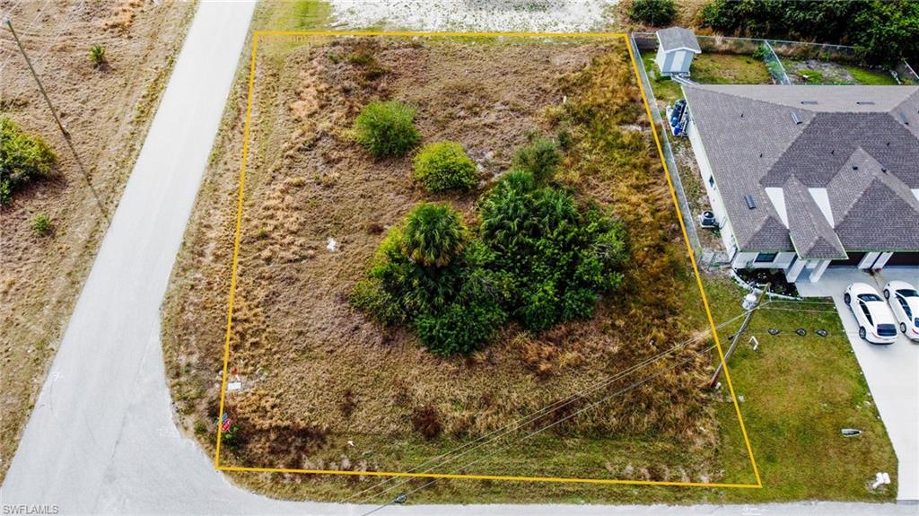 Aerial overview of property's location with property parcel outlined