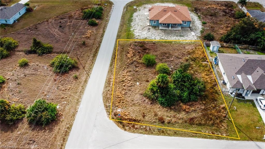 Aerial overview of property's location featuring property parcel outlined
