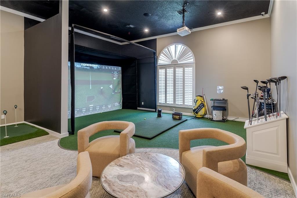 Playroom featuring golf simulator, recessed lighting, crown molding, a putting green, and a textured ceiling