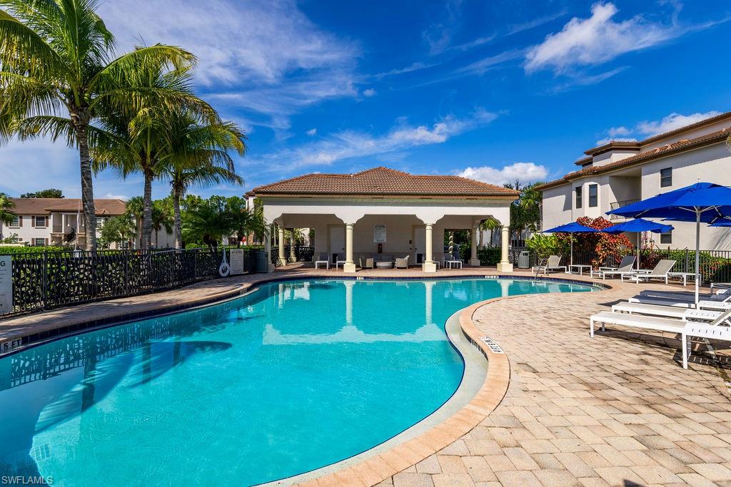 Community pool featuring a patio area