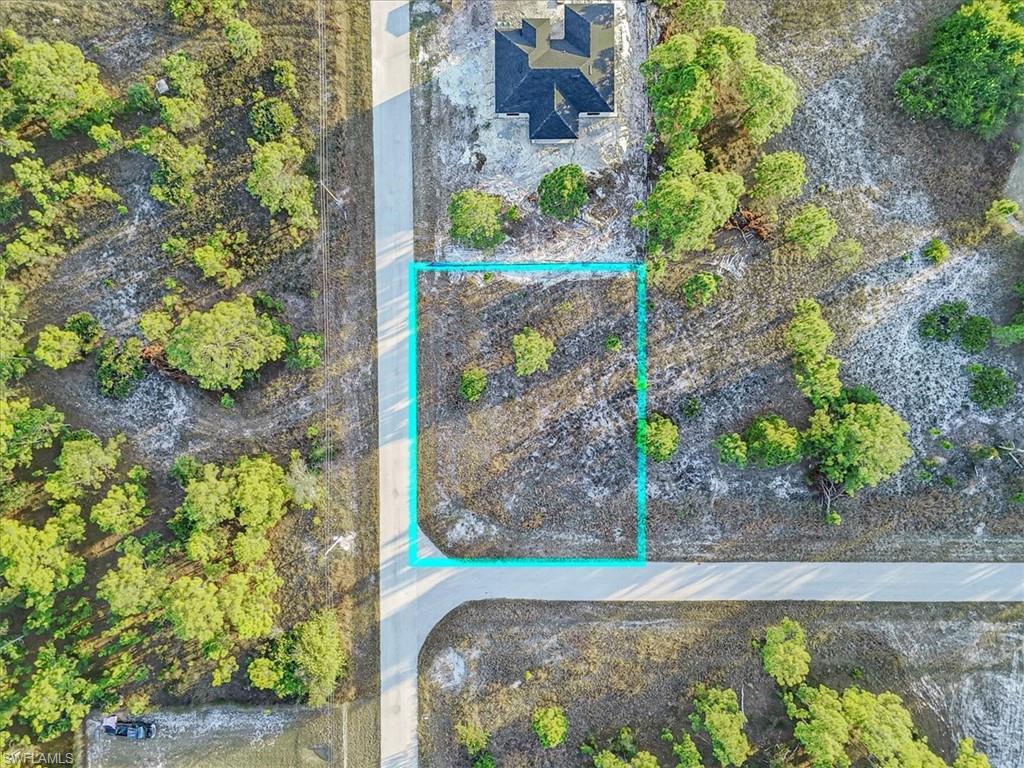 Aerial overview of property's location with property parcel outlined