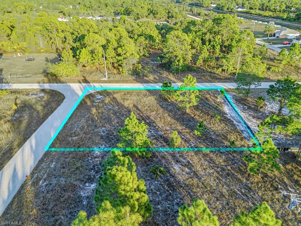 Aerial overview of property's location with property parcel outlined