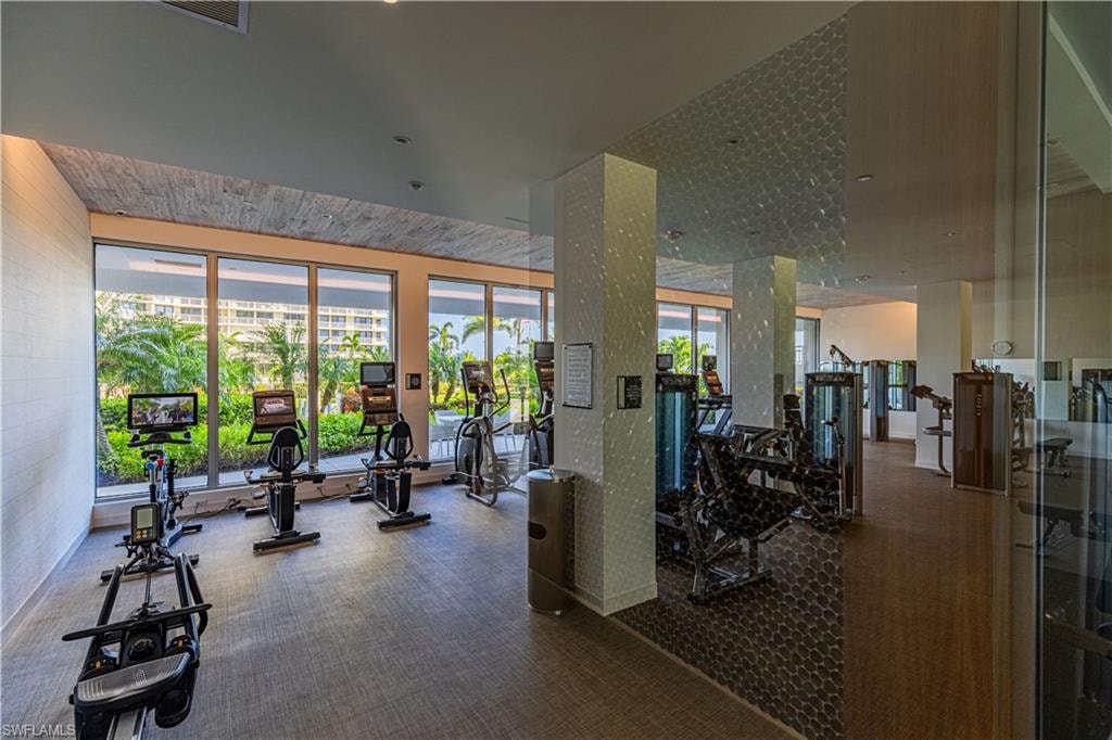 Workout area featuring carpet floors