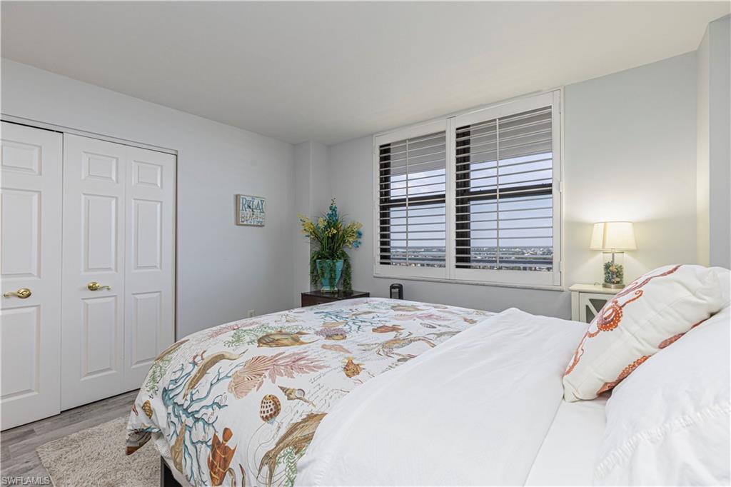 Bedroom featuring a closet and hardwood / wood-style flooring