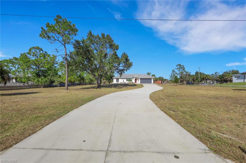View of front of property featuring driveway