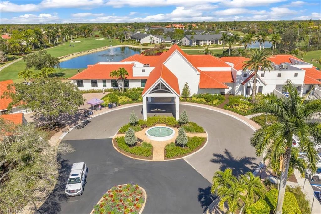 Drone / aerial view of a large body of water and a local golf course