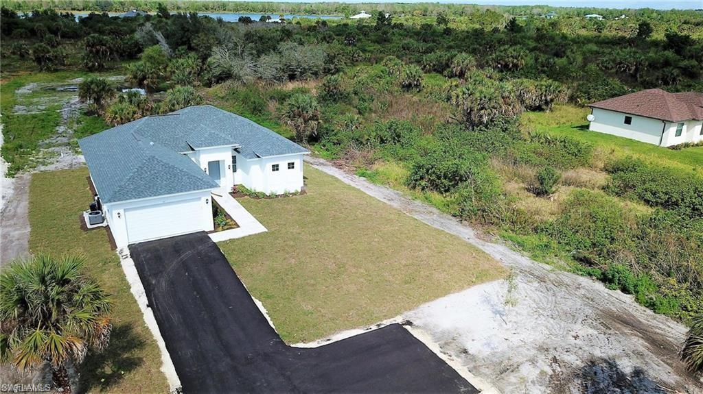 Aerial view of property and surrounding area