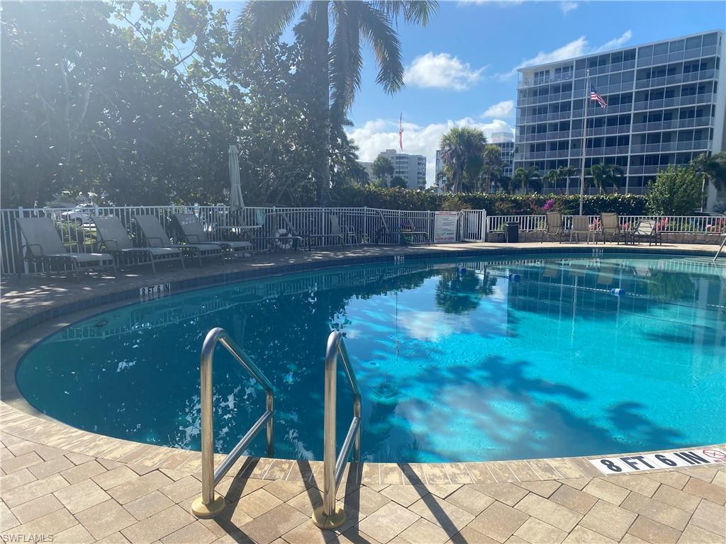 Community pool featuring a patio area