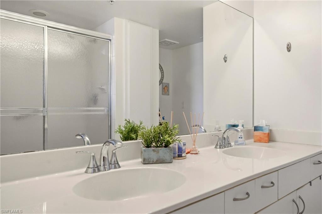 Primary bath with dual vanity and walk-in shower