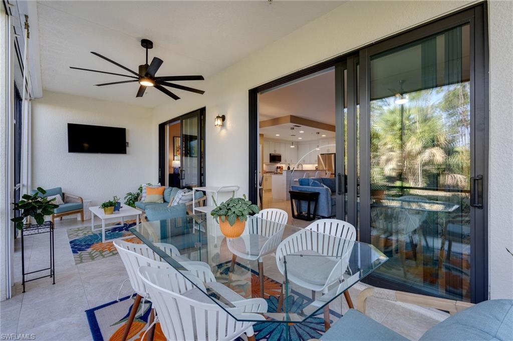 Oversized lanai accommodates sitting area  and dining for for six!