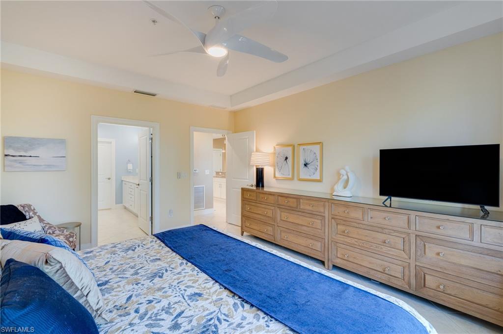 The primary bedroom features a solid core upgraded door for privacy and a large ensuite bathroom.