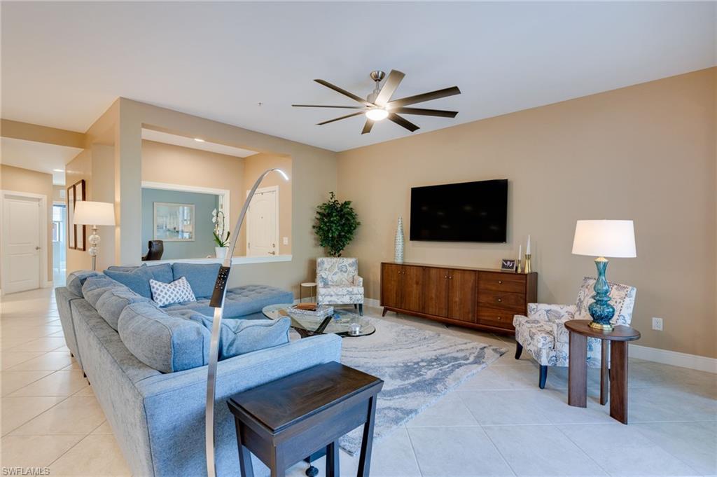Living room with 9' 4" ceilings and main entrance foyer.