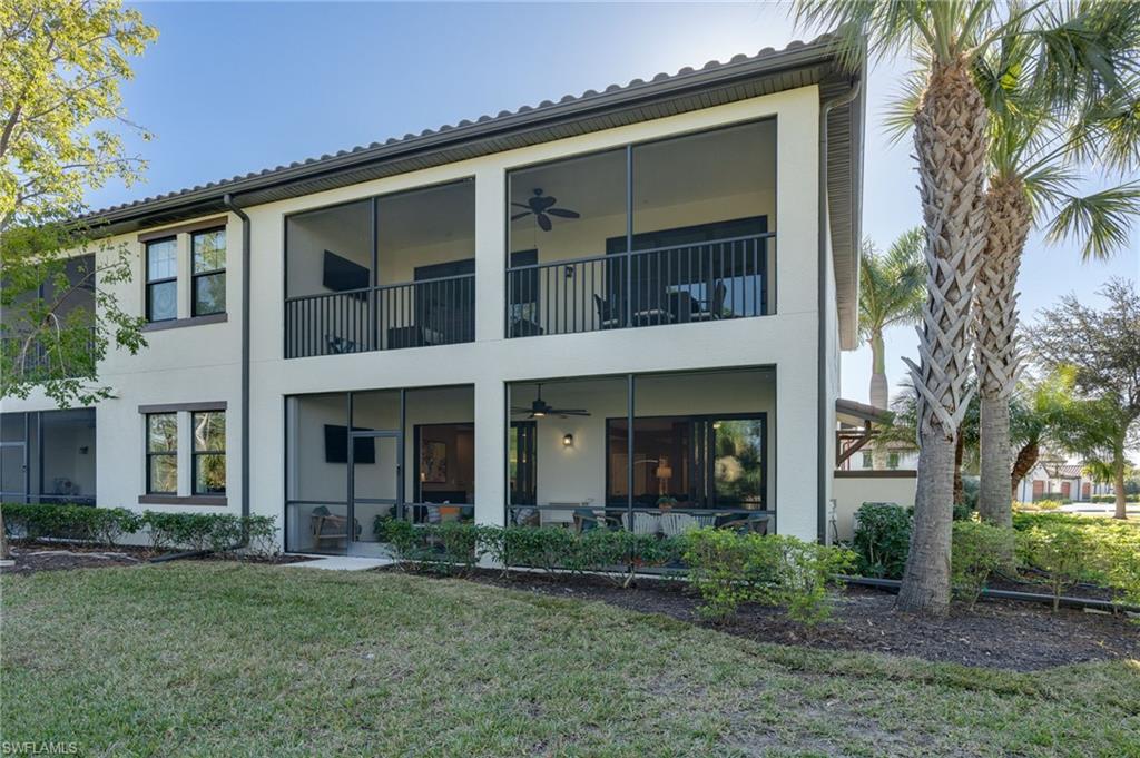 The back of the property illustrates the end-unit position that offers privacy and additional windows and shows the side and backyard.