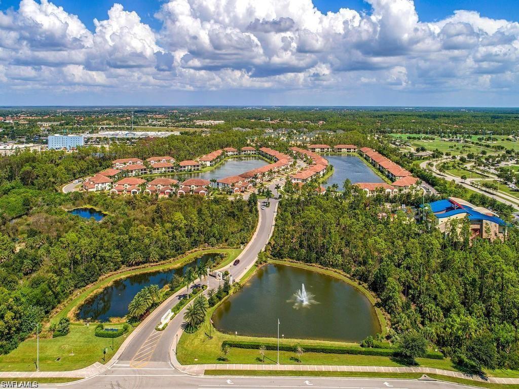 Aerial view of gated entrance off Livingston Rd with twin lakes.