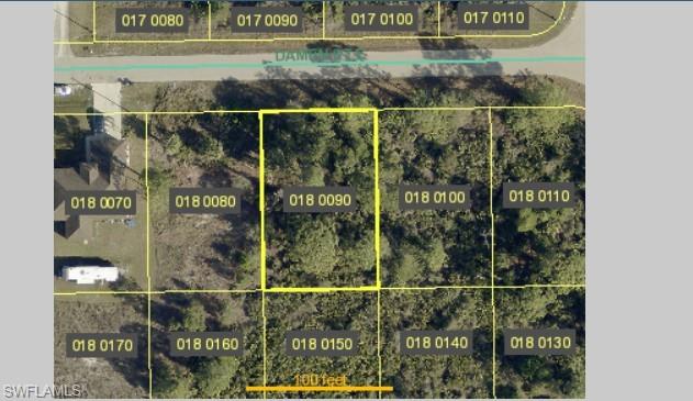 Aerial map of property and surrounding area featuring property boundaries highlighted