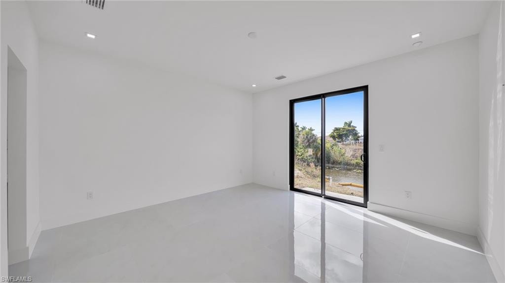 Unfurnished room featuring recessed lighting