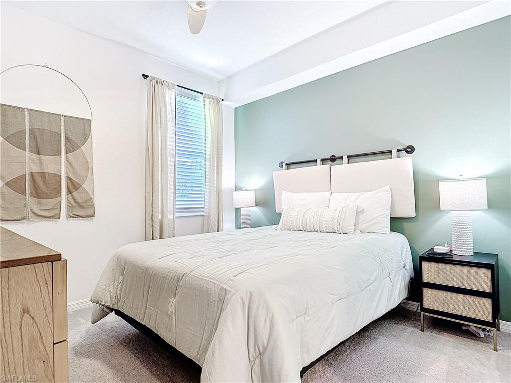 Bedroom with carpet flooring and ceiling fan