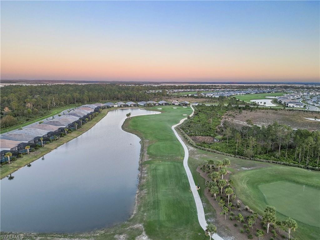 Aerial view at dusk with a water view