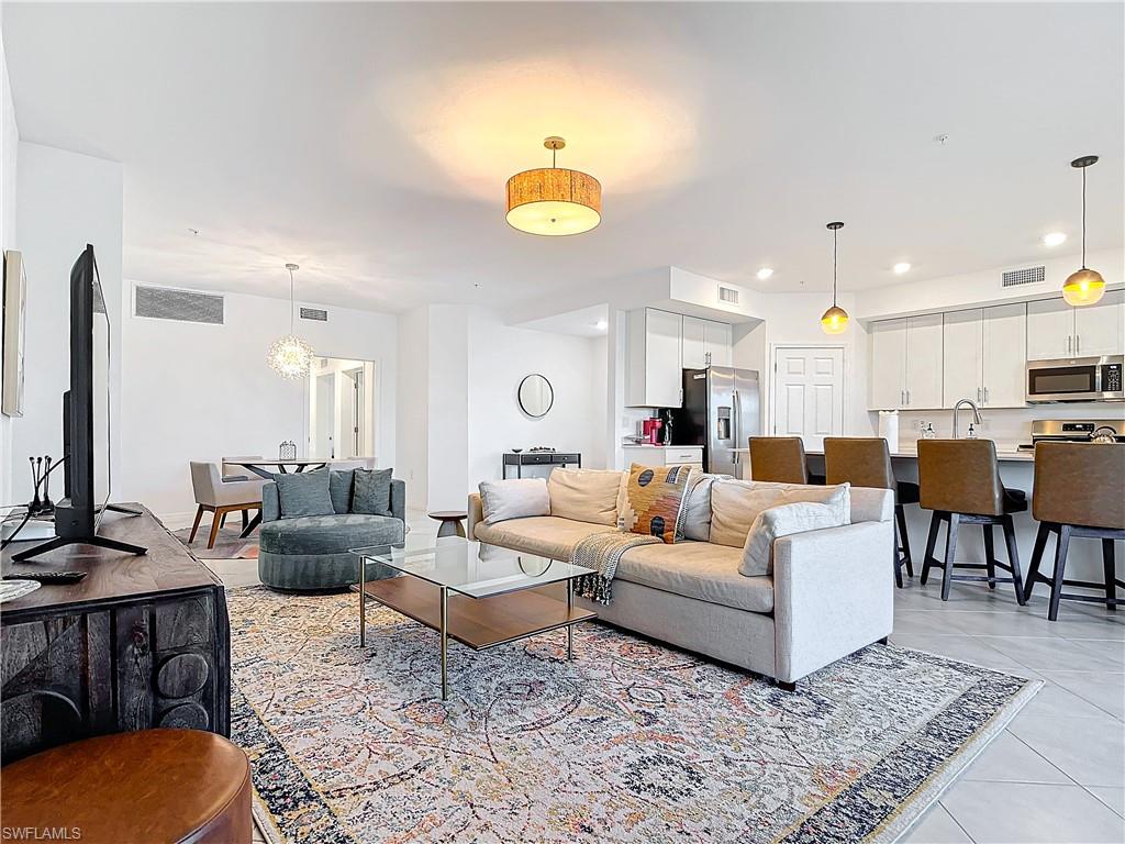 Tiled living room with sink