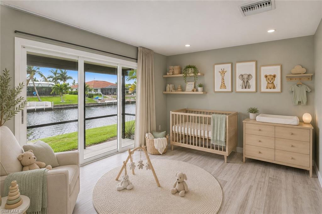Versatile Bonus room off of primary suite virtually staged as nursery