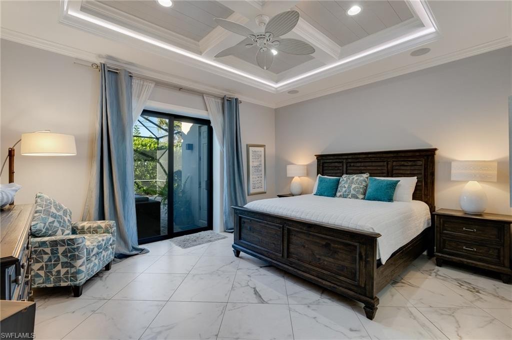 Bedroom featuring coffered ceiling, recessed lighting, crown molding, access to exterior, and light marble finish floors