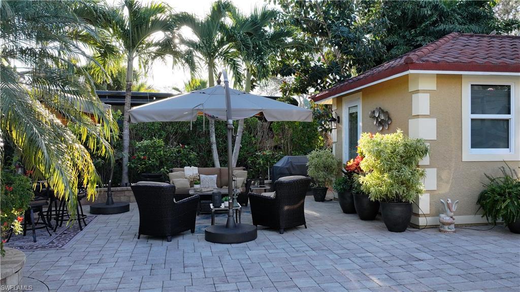 View of patio featuring outdoor lounge area and grilling area