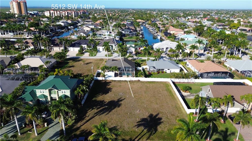 Aerial view of residential area with a large body of water