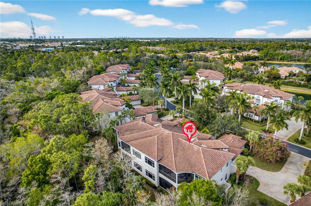 Aerial overview of property's location featuring nearby suburban area