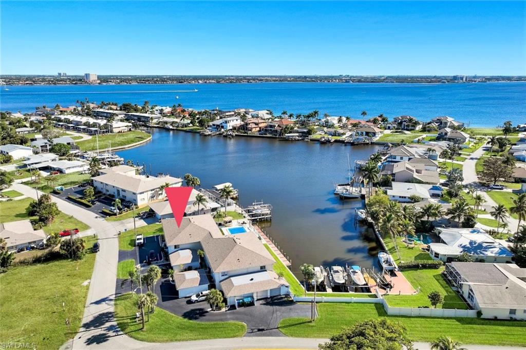 Aerial view of residential area with a large body of water