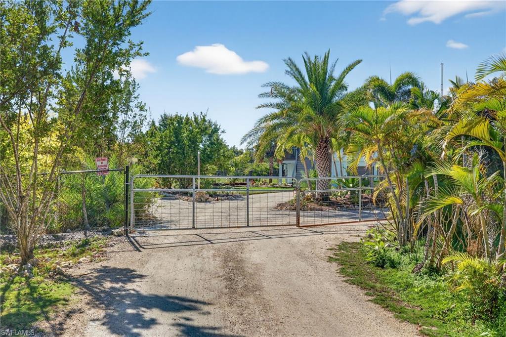 Private driveway is gated and away from the house.