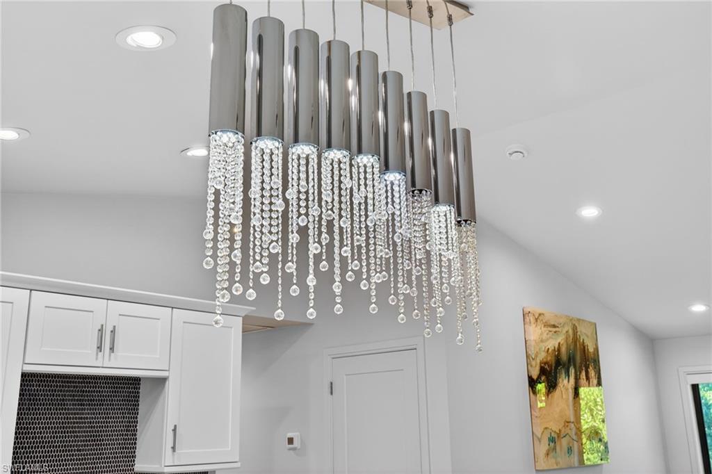 Custom designer drop down crystal chandelier.