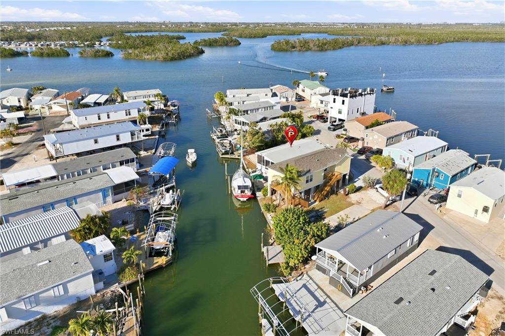 Aerial view of residential area with a large body of water