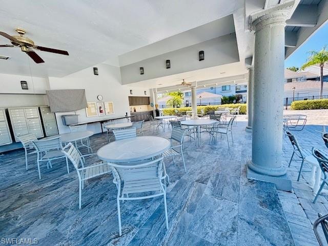 View of patio / terrace with a ceiling fan and outdoor dining space