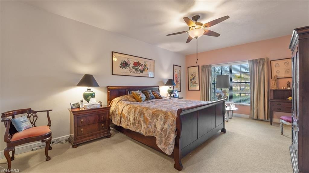 Bedroom with carpet and ceiling fan