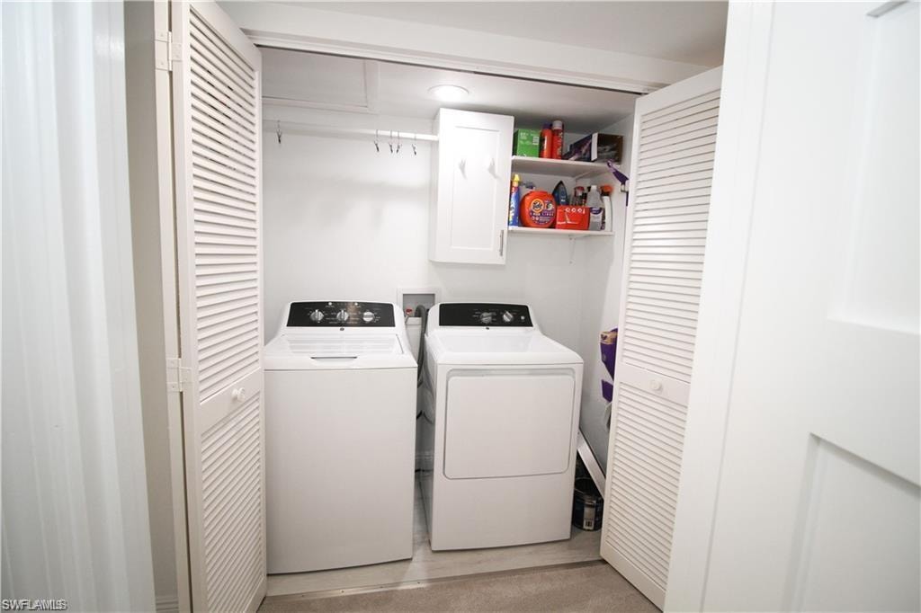 Laundry room featuring independent washer and dryer