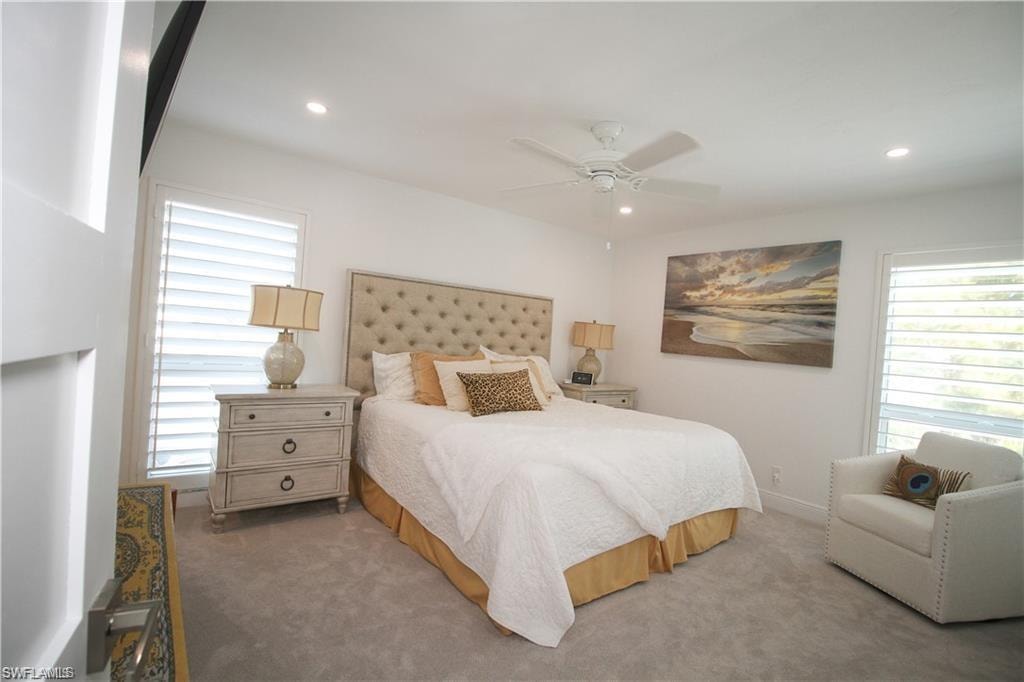 Bedroom featuring ceiling fan, carpet flooring, and recessed lighting