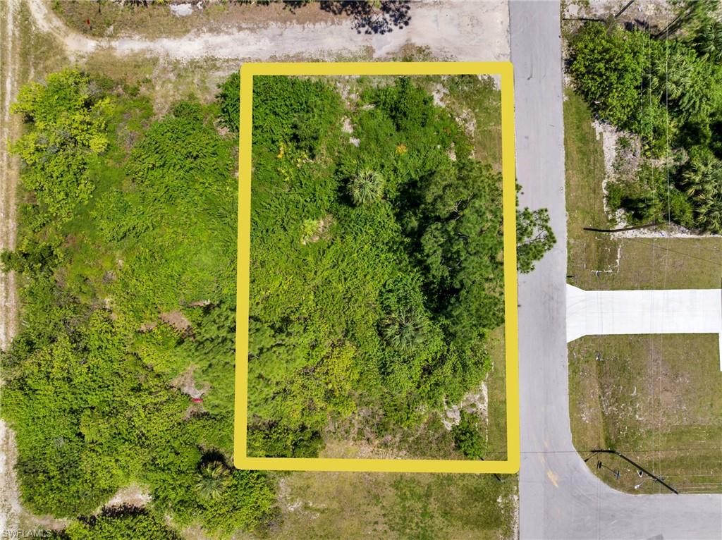 Aerial view of property's location featuring property parcel outlined