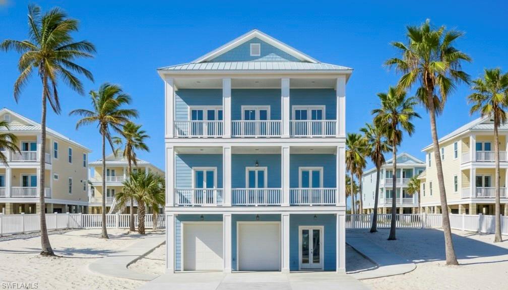 Front 3D rendering home with 2 attached garages & outdoor decks- virtually enhanced