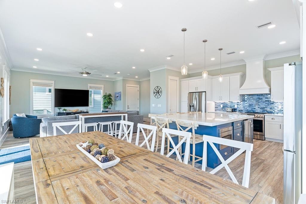 Virtually enhanced photos from similar completed home by builder- Finishes and features shown may vary from subject property.