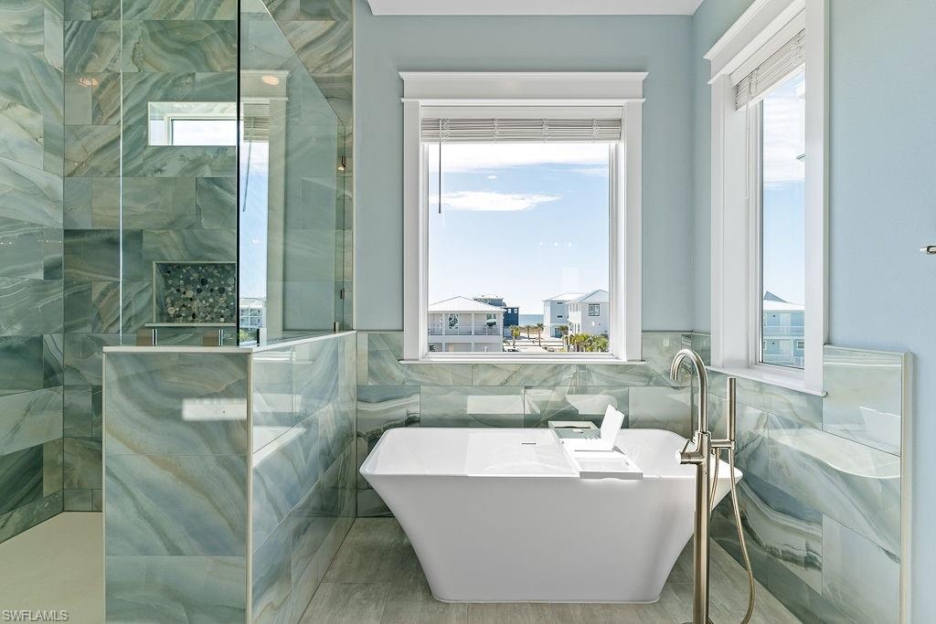 Virtually enhanced photos from similar completed home by builder- Finishes and features shown may vary from subject property.