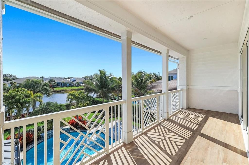 Balcony with view of pool area